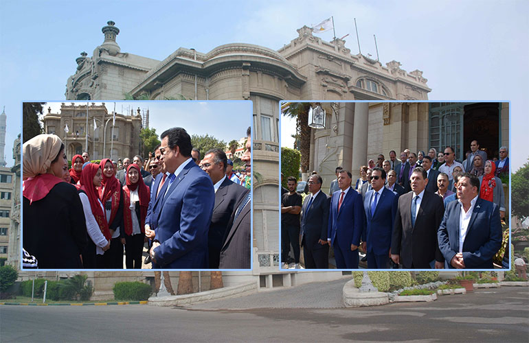 The Minister of Higher Education and the President of the University witness the ceremony of greeting the flag in front of the Zafaran Palace