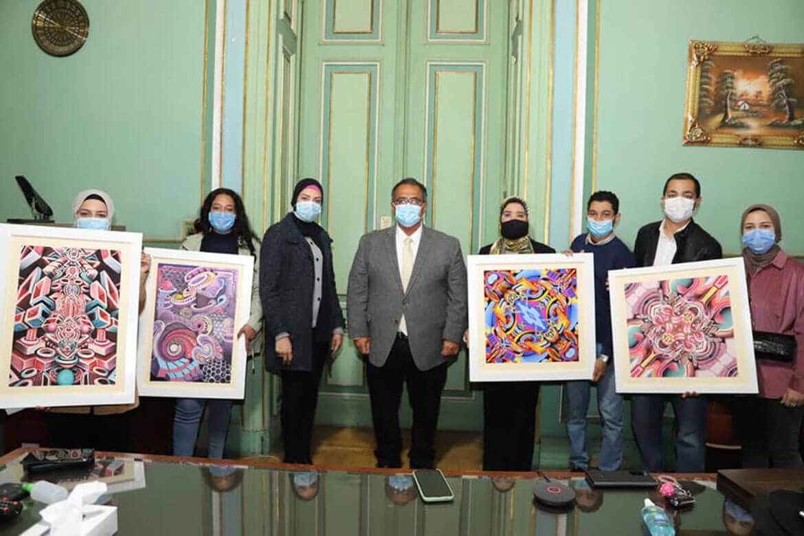 The Vice President for Education and Students Affairs honors the talented students of specific education and buys a set of their artistic paintings