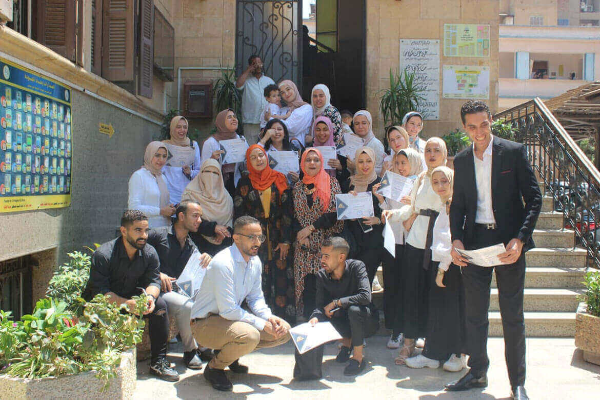 The Dean of the Faculty of Specific Education at Ain Shams University honors the work team of the digital library unit at the faculty