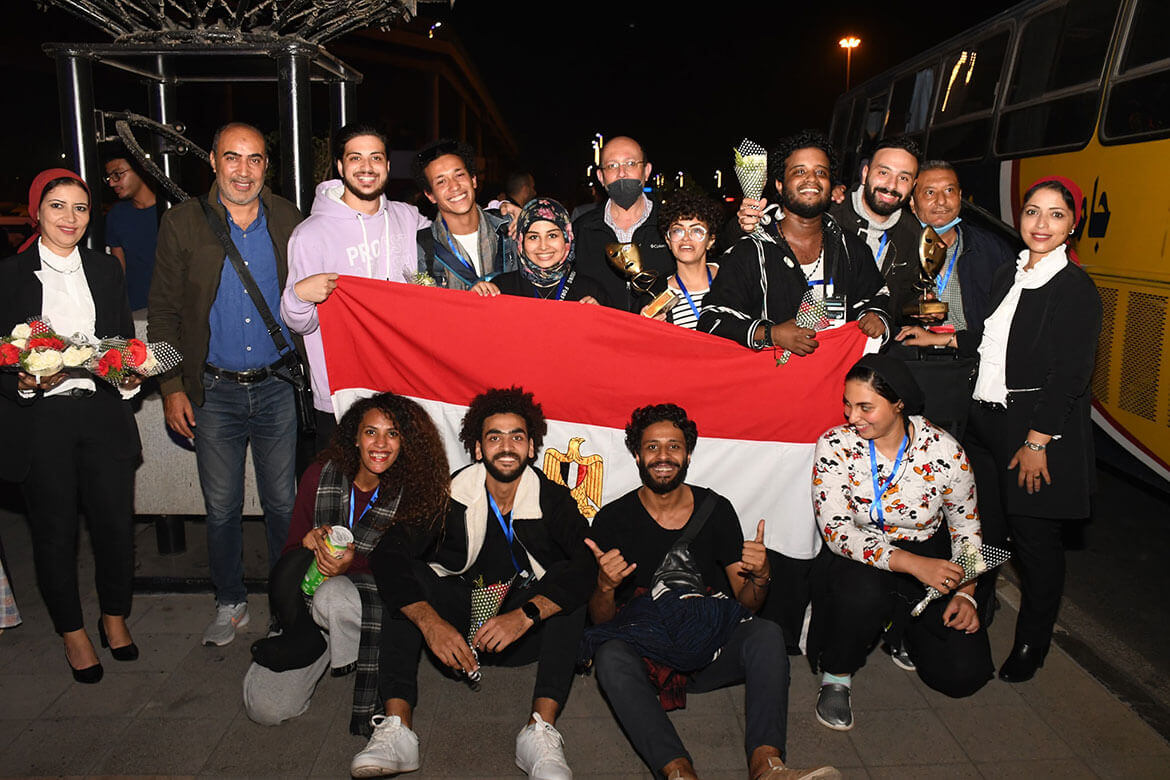 Ain Shams University Students were received with flowers in Cairo Airport after gaining half of the prizes in Tangier International University Theater Festival