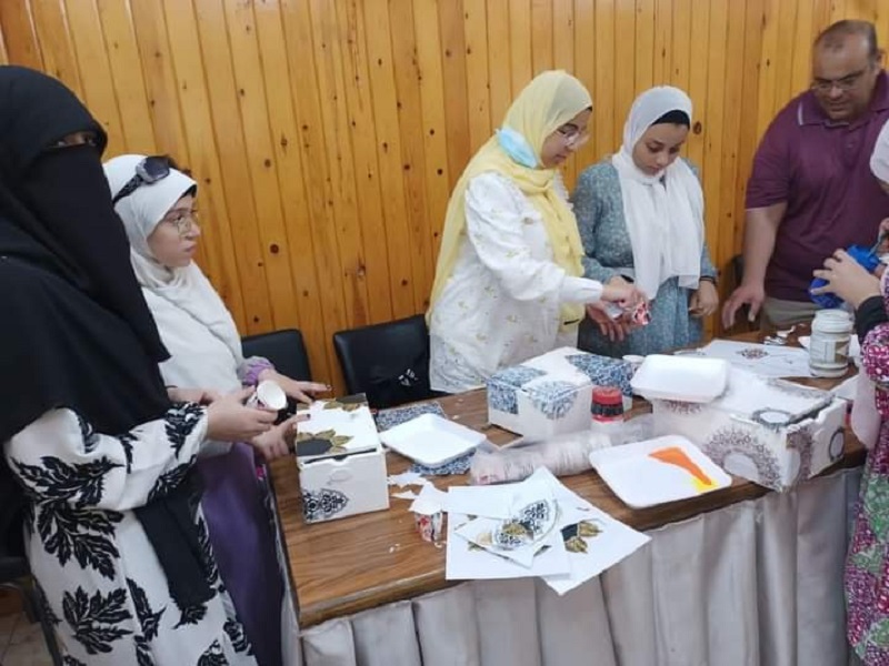 A workshop entitled Beautifying Recycled Wood Pieces at the Faculty of Girls