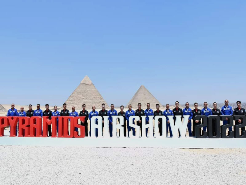 A delegation of Ain Shams University students and students of determination attend the Pyramids Air Show 2022 at the Pyramids of Giza