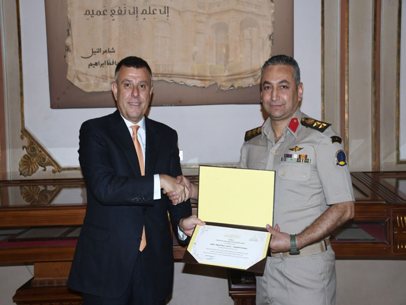 The President of Ain Shams University honors Colonel Ahmed Allam, Director of the Military Education Department at the university