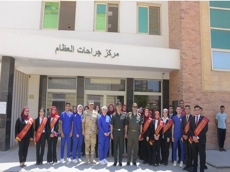 A delegation of Ain Shams University students visited the injured of the Armed Forces at Helmeyah Military Hospital