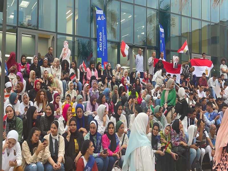 The family of Students for Egypt at Ain Shams University participates in a march to support President Sisi’s candidacy for the 2024 presidential elections