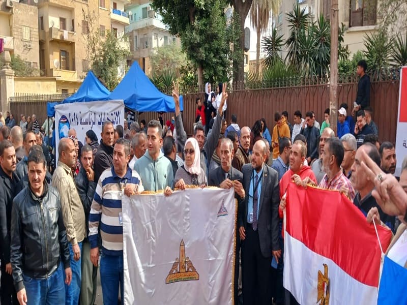 Ain Shams University employees cast their votes in the presidential elections on the first day