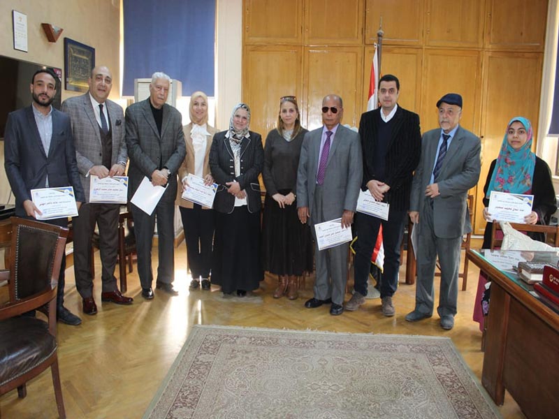The Dean of the Faculty of Arts honors the winners of the Faculty in literary competitions for the university's celebration of the International Day of the Arabic Language