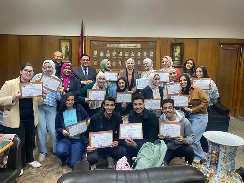 The Dean of the Faculty of Al-Alsun honors the faculty choir team the winner of the first place at the university level
