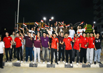 For the second time, students from Ain Shams University dormitories cheered on the national team in front of a giant "Fan Zone" screen in the New Administrative Capital